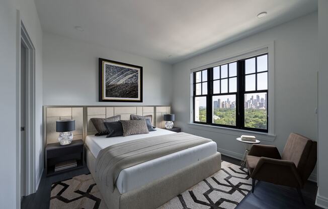a bedroom with a bed and a window  at The Belden Stratford, Illinois