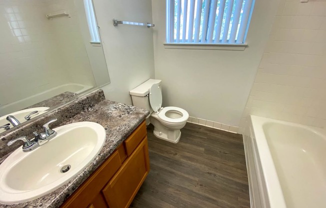 Bathroom with granite coutertop, at Gale Gardens Apartments