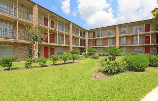 a large lawn in front of a building