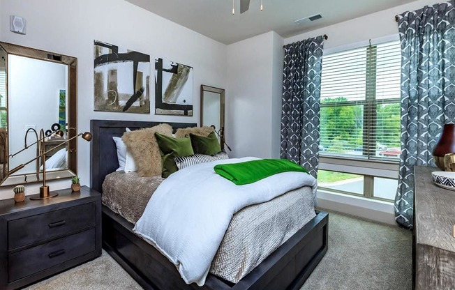 Spacious Berewick Pointe Bedroom With Comfortable Bed in Charlotte, NC Apartment Homes for Rent