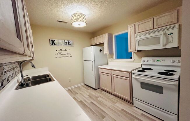 Beautiful Maintenance free 2 bedroom 2 bath main level condo in NW Greensboro off W. Friendly Ave.
