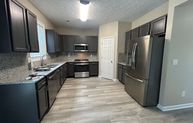 2405 Village Green Dr – 4 BD 2.5 BTH - Available Now! BONUS - Quick Access to Hartfield-Jackson Airport and I-85/I-285
