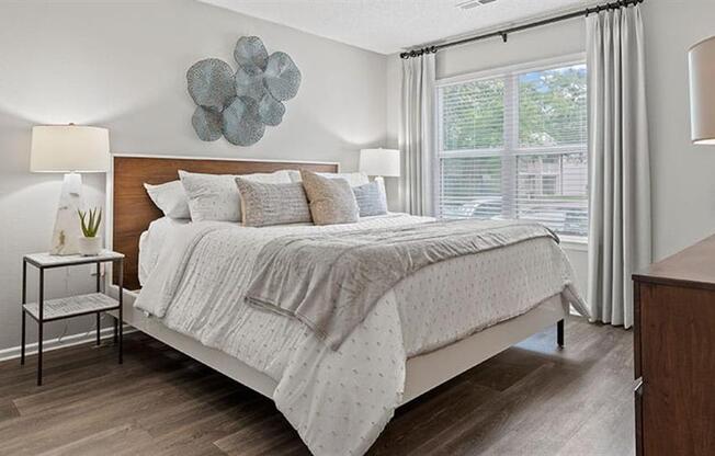 a bedroom with a bed and a window at Trails at Short Pump Apartments, Richmond, Virginia