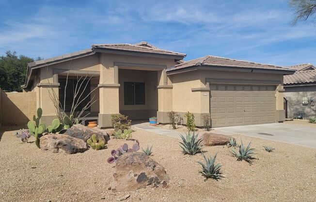 SOLAR & NEW CARPET makes this home a BARGAIN!  Estrella Mtn Ranch amenities!