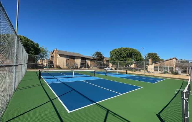 two tennis courts at the preserve at polo ridge