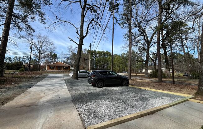 Modern 2BD*, 2BA with 3rd Bonus Room Near Downtown Durham with Assigned Off-Street Parking and Backyard