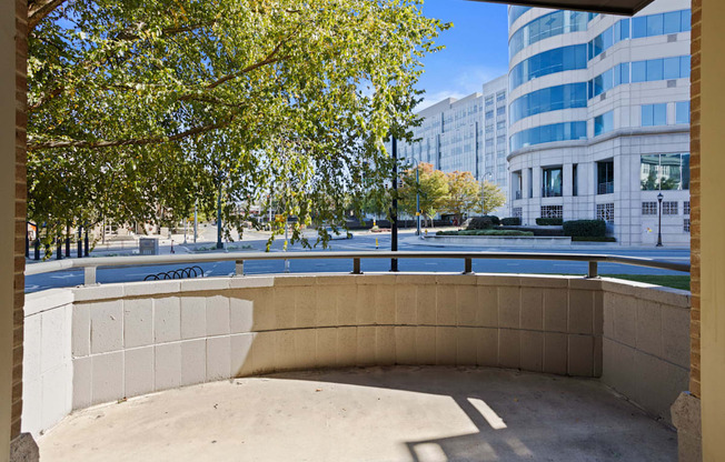 Flatiron West Trade Apartments patio with cement flooring