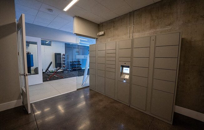 a row of lockers in a room with a door