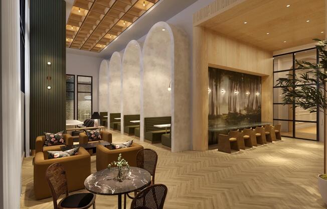 Coworking space with private work stations, coffee bar, and comfortable seating areas.