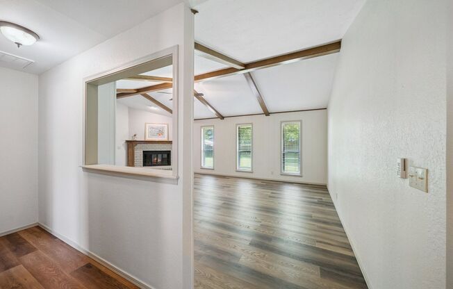 Spacious Single Story 4 Room Home + Sunroom on Nearly 1/2 Acre Lot!