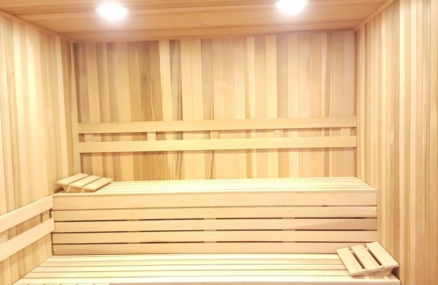 Sauna room with 3 wall-length benches