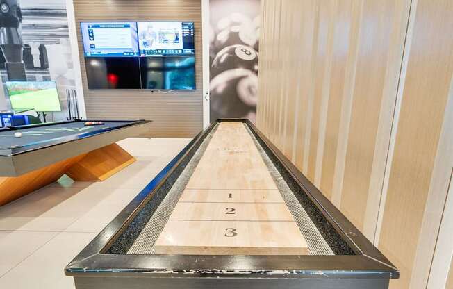 Shuffleboard in game room