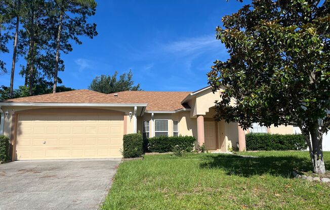 Updated Single family 3 / 2 with Screened in Patio!