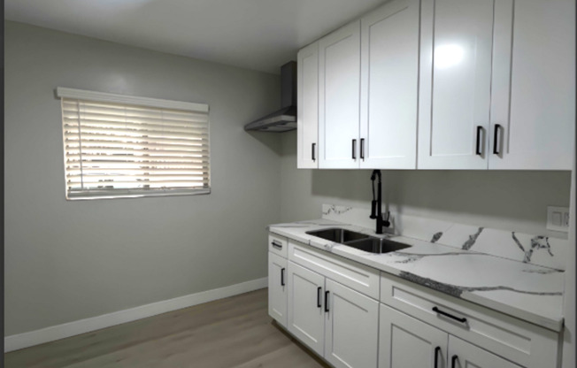 1245 W. 39th Pl.