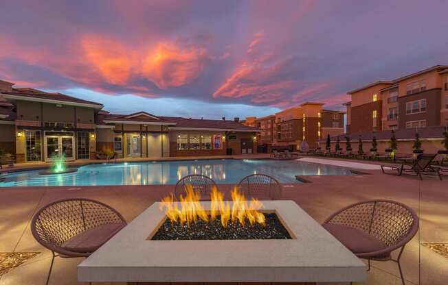 outdoor firepit at dusk at Malbec at Vallagio