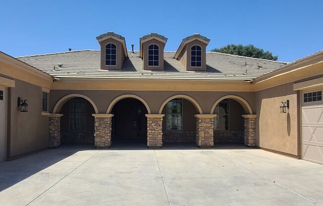 4 or 5 bedroom, 4-car garage home on edge of Queen Creek & Gilbert.