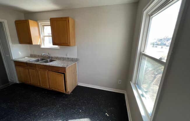 3 Bed 1 Bath bungalow with basement on eastside of Detroit. Fresh paint, refinished floors!