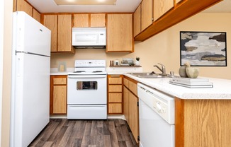 Apartment Kitchen at 55+ FountainGlen Goldenwest, Westminster, CA