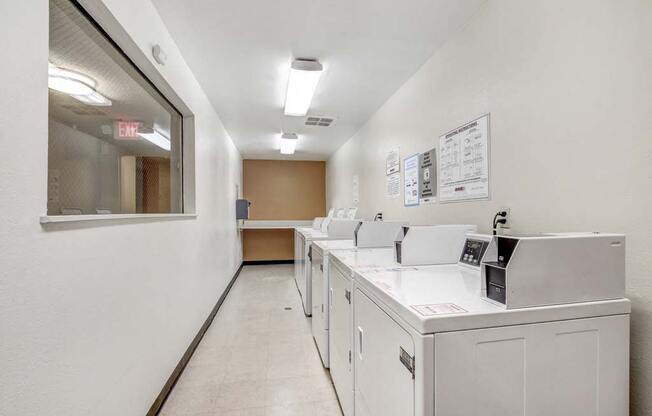 a washer and dryer in a room  at Sherway Villa, Reseda, 91335