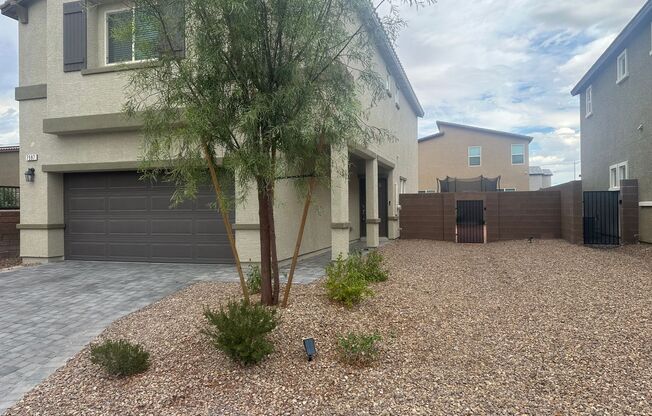 NW!! Gated!! Built 2023!!!! Corner Lot!! Low Maintenance Desert Landscape Front!! Patio & Synthetic Grass in Back!! Pet Friendly!!