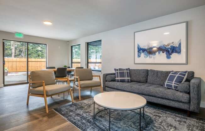 an open living room with a couch and a coffee table