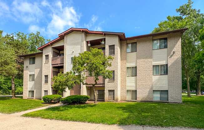 Exterior of cozy apartment homes at Woodland Villa Apartments in Westland, MI.