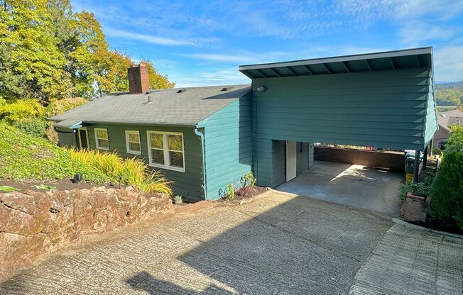 South Portland Hilltop Ranch Home with Indescribable East Views, Hardwood Floors, Gas Fireplace, Laundry, Off-street Parking