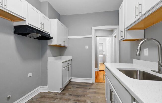 7557-59 S. Calumet Ave. / 348-58 E 76th St.