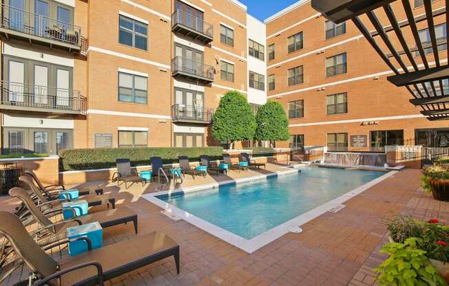 our apartments have a large pool and lounge chairs