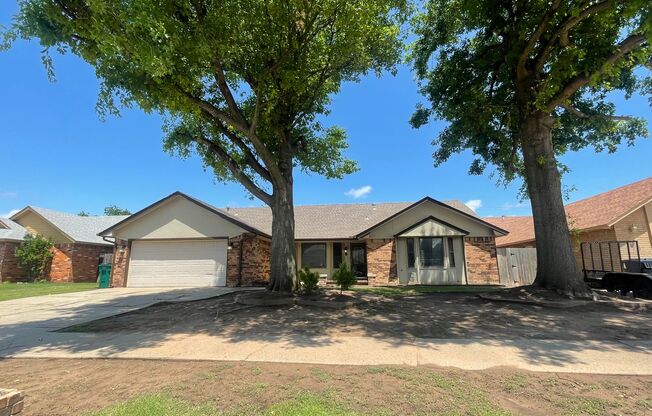 4 bed 2.5 baths in Moore Schools. 2 living areas, formal dining, storm shelter and pool!