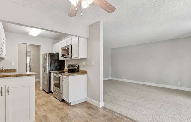 an open kitchen and living room with an open floor plan at Summerwood Apartments, Santa Clara, 95050