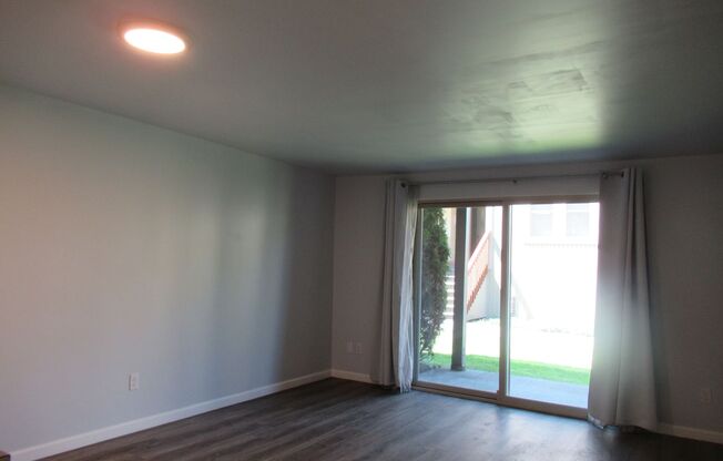 Ground Level, end unit one bedroom, one bathroom condo in Federal Lake