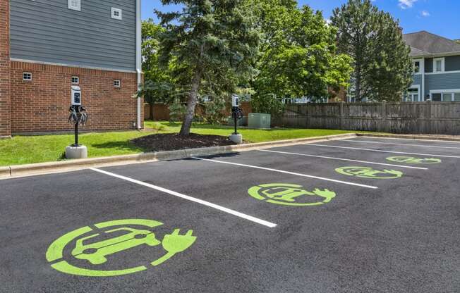 a parking lot with symbols of bikes on the ground