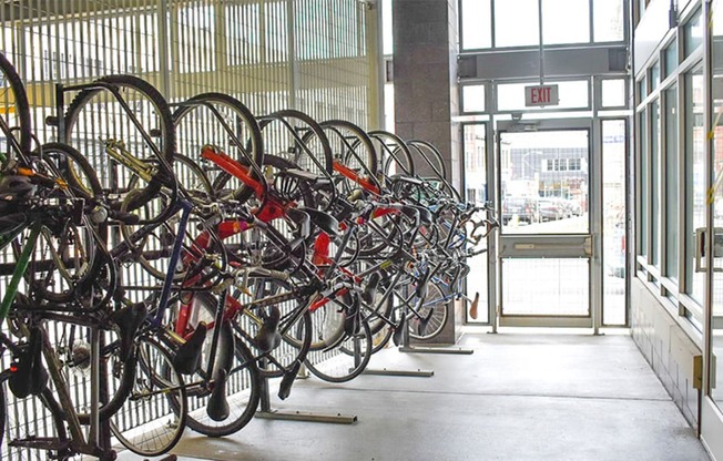 a room filled with lots of bikes sitting next to each other