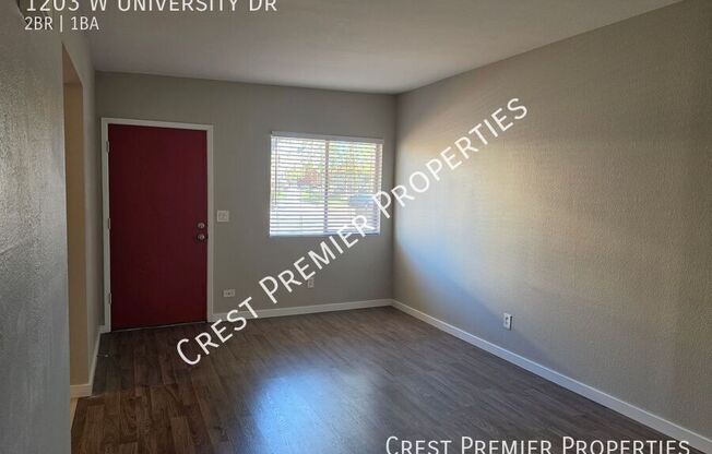 1203 W UNIVERSITY DR