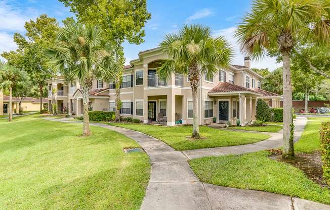 A row of houses with a walkway between them.