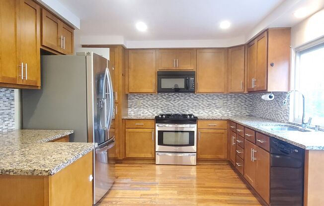 Spacious Townhome, A/C, 2c Garage, Renovated Kitchen, Beautiful Master Bathroom!