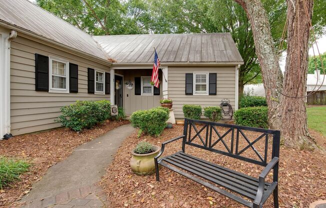 A picture perfect cottage home ready for you with community pool!