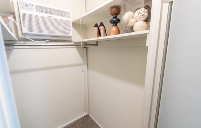 This is a picture of the walk-in closet in a 578 sq foot 1 bedroom, 1 bath apartment at Red Bank Reserve in the Madisonville neighborhood of Cincinnati, Ohio.