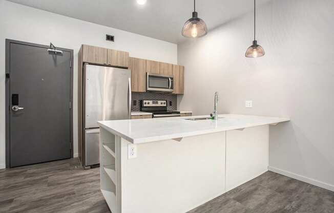 234 Market Apartments In Grand Rapids, MI With Spacious Open Concept Living Areas With Modern Kitchens & Quartz Countertops