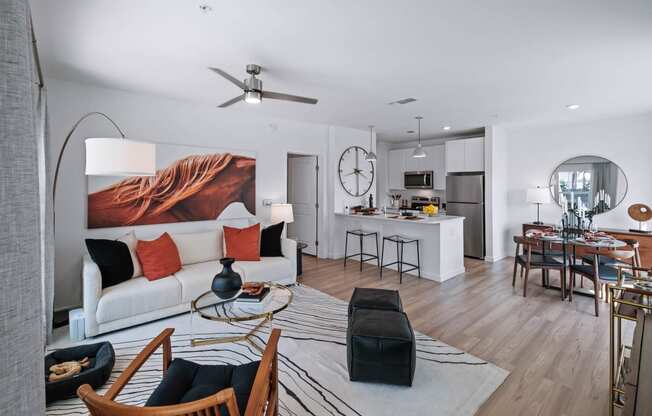 a living room with a couch and a table at Altis Grand Suncoast, Land O' Lakes, 34638