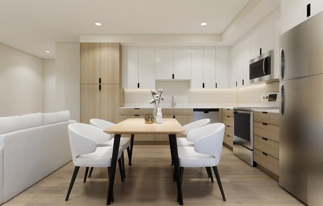 a dining area with white chairs at Lotus Republic Apartments for rent in Downtown Salt Lake City, Utah