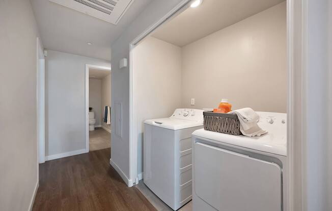 A laundry room with a washer and dryer.