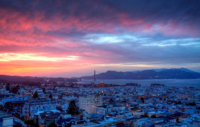 a view of the golden gate bridge in san francisco at sunset