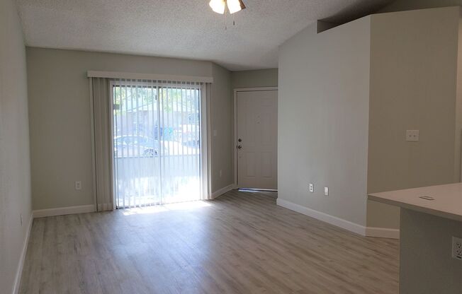 Ground Level Condo; Private Driveway; Corner Unit; Outdoor Space; Quiet Street