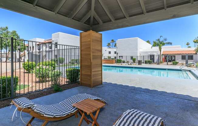 our apartments have a large pool and lounge chairs at Tides at Mesa, Mesa