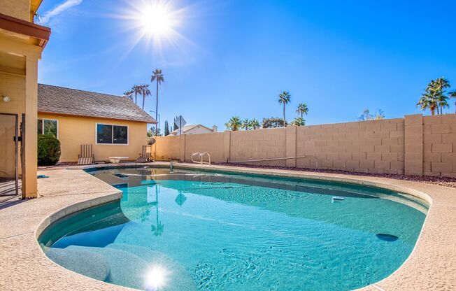 Stunning 5 Bed, 3.5 Bath Dobson Ranch Home with Dual Primary Suites and Sparkling Pool!