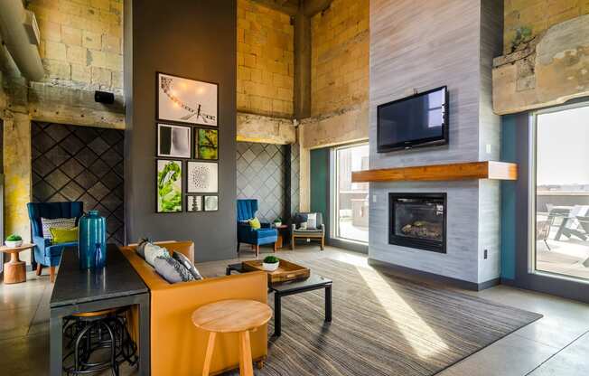 Resident clubhouse great room with fireplace - Eitel Apartments