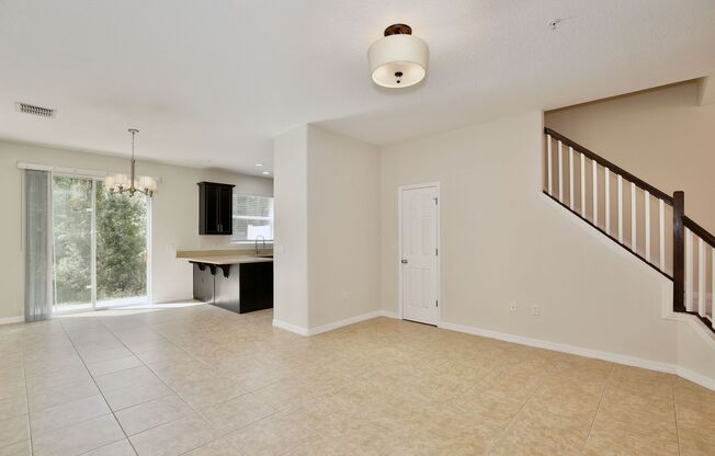 Stylish 3/2.5 Townhome with Open Floor Plan, Garage & Patio in Gated Community