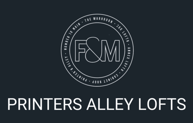 a logo with the words printers alley lofts on a black background